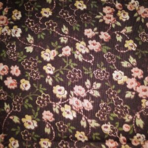 Peach and Yellow Flowers on Brown Background by Quilting Treasures number unknown sold by 1/2 yd.