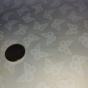 White Butterflies on Cream No# one yard remnant